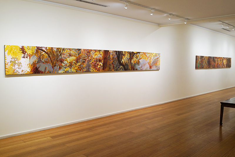 MARY TONKIN Two spots Australian galleries Between two logs... 2014 oil on linen 54 x 487 cm,  Above the white gums... 2014 oil on linen 54 x 447 cm