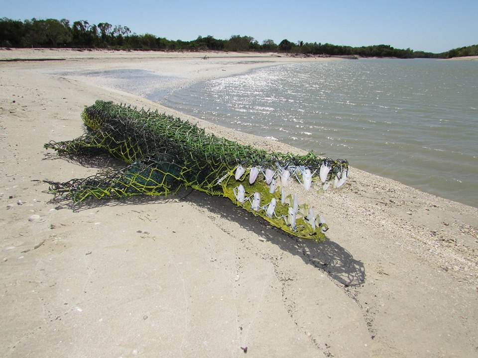 Crocodile ghost net sculpture, image courtesy and copyright artist Michael Norman and Pormpuraaw Arts and Cultural Centre